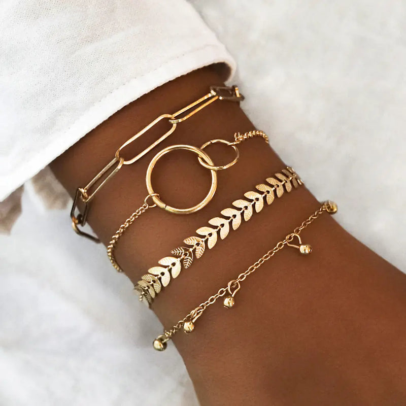 Set of 4 Boho Bracelets with Stars, Moons, and Leaves